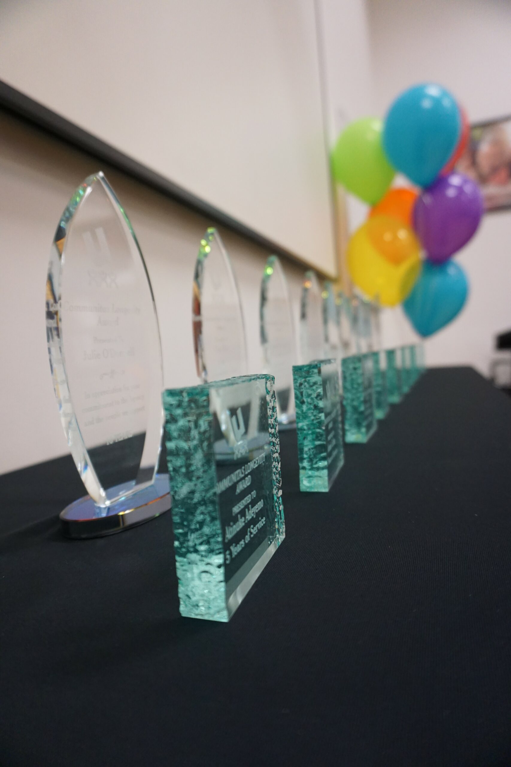 Awards, with balloons in the distance